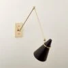 Aldus Black And Polished Brass Articulating Wall Sconce 2 Aldus Black And Polished Brass Articulating Wall Sconce -Cb2 AldusBkNPldBrsArtlngScncSHF22