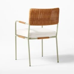 Colombe Green Metal And Rattan Outdoor Dining Armchair With Ivory Sunbrella® Cushion -Cb2 ColombeVertDiningChair3QBSSS23