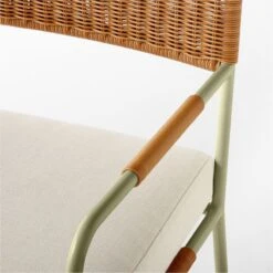 Colombe Green Metal And Rattan Outdoor Dining Armchair With Ivory Sunbrella® Cushion -Cb2 ColombeVertDiningChairAV3SSS23