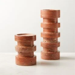 Dev Red Travertine Candle Holders -Cb2 DevRedTrvrtnPillarHldrGrpFHS22