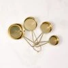 Dose Champagne Gold Measuring Cups -Cb2 DoseChpgnGldMeasuringCupsSHF22