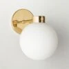 Marra Polished Brass Globe Wall Sconce Light 1 Marra Polished Brass Globe Wall Sconce Light -Cb2 MarraPldBrsSngScncAV2SHS23