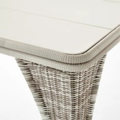 Nino Ivory Rattan Outdoor Dining Table -Cb2 NinoDiningTableAVSSS23