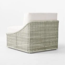 Nino Ivory Rattan Outdoor Lounge Chair With Ivory Boucle Sunbrella® Cushions 16 Nino Ivory Rattan Outdoor Lounge Chair With Ivory Boucle Sunbrella® Cushions -Cb2 NinoLoungeChair3QBSSS23