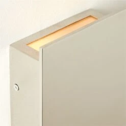 Piatto Indoor/Outdoor Polished Stainless Steel Wall Sconce -Cb2 PiattoPldSSInNOutdrScncAVSHF22