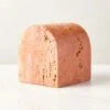 Red Travertine Arched Bookend 1 Red Travertine Arched Bookend -Cb2 RedTrvrtnArchBookendSHS23