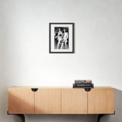 'Mick And Bianca At The London Airport, 1970' Photographic Print In Black Frame 17.5"x21.5" 8 'Mick And Bianca At The London Airport, 1970' Photographic Print In Black Frame 17.5"x21.5" -Cb2 SEMickNBiancaBlk21p5x17p5S22 3D